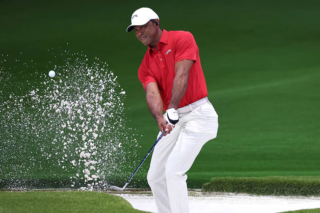 Tiger Woods of Jupiter Links Golf Club plays a shot from a bunker on the eighth hole during the match against the Los Angeles Golf Club at SoFi Center on March 24, 2026 in Palm Beach Gardens, Florida. 